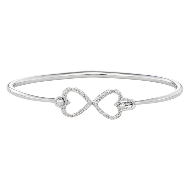 "Fall in love with the timeless style of this diamond heart bangle bracelet. Fall in love with the timeless style of this diamond heart bangle bracelet. Packaging: boxed Base material: sterling silver Bracelet length: 7 in. Plating: 10k white gold plated, platinum Finish: polished Nickel free DIAMOND DETAILS Setting; prong Total weight: 1/6 ct. Color grade: H-I Clarity: I1-I2 Size: 7"". Gender: female. Age Group: adult." White Gold Diamond Heart Bracelet For Anniversary, Valentine's Day White Gold Cubic Zirconia Diamond Bracelet, Diamond Heart Bracelet With Accents, Heart Shaped Diamond Bracelet With Accents, Diamond Heart Bracelet With Diamond Accents, Elegant White Gold Diamond Bracelet For Valentine's Day, Classic White Gold Diamond Heart Bracelet, Classic Diamond Heart Bracelet In White Gold, White Gold Heart-shaped Diamond Bracelet