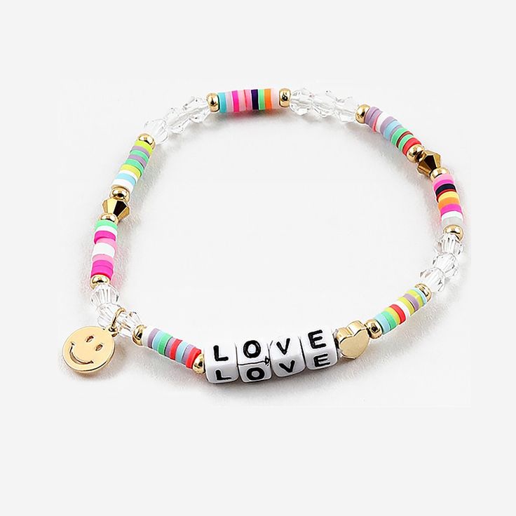 "A colorful, sparkling, beautiful stretch rainbow bracelet. A perfect gift for moms, grandmas, sisters, brides-to-be, bridesmaids, flower girls, baby showers, graduations, birthdays, bachelorette parties, best friends, teachers... The list is endless. stretch | rainbow | rubber | Fimo | word bracelet | MAMA | inspiration bracelet | HAPPY | smile face | happy face - Materials: Heishi Beads, Clay Disc Beads, Gold Beads, Letter Beads - 8mm high polished gold plating smile casting - Sizing 0.25\" - Cheerful Adjustable Multicolor Friendship Bracelets, Cheerful Multicolor Adjustable Friendship Bracelets, Cheerful Adjustable Friendship Bracelets As Gift, Valentine's Day Playful Beaded Jewelry, Multicolor Heart Beads Bracelets For Mother's Day, Multicolor Letter Beads Bracelets For Valentine's Day, Cheerful Adjustable Jewelry For Friendship, Multicolor Letter Beads Bracelet For Valentine's Day, Multicolor Friendship Bracelets For Valentine's Day