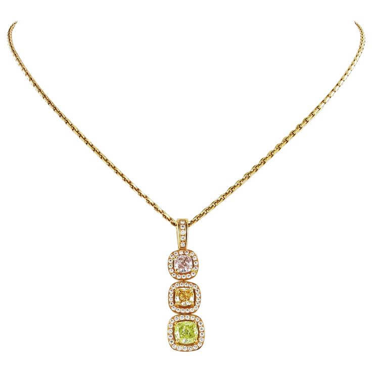 Beautiful necklace in redgold 750 manufactured by famous Swiss Jeweler Gübelin. All three fancy colored diamonds are GIA certified and of natural color. Cushion 0.31 ct (fancy light purplish pink - vs1), Cushion 0.31 ct (fancy yellow orange - si1), Cushion 0.56 ct (fancy yellow green- si1). Further set with 61 brilliant-cut diamonds totaling 0.30 ct. Superb workmanship! Maker's mark: Gübelin Assay mark: 750 Stock no. 1000096887 Diamond Gold Necklace, Victoire De Castellane, Art Deco Pendant Necklace, Platinum Chain, Victorian Pendants, Jaune Orange, Art Deco Pendant, Gold Diamond Necklace, Diamond Gold