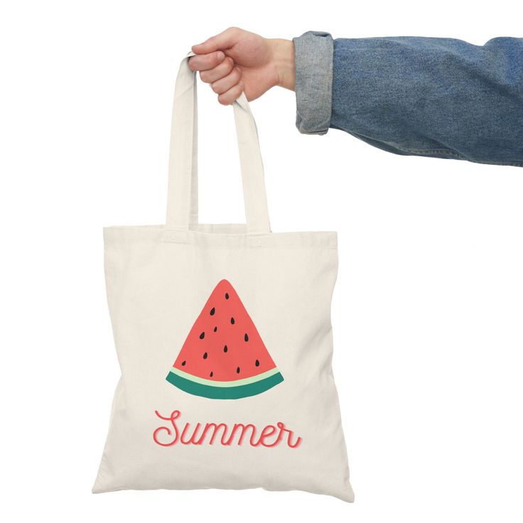 a person holding a watermelon bag with the word summer printed on it's side