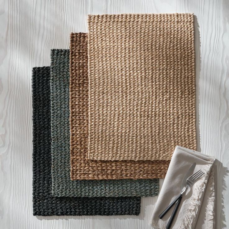 woven placemats and napkins laid out on top of each other