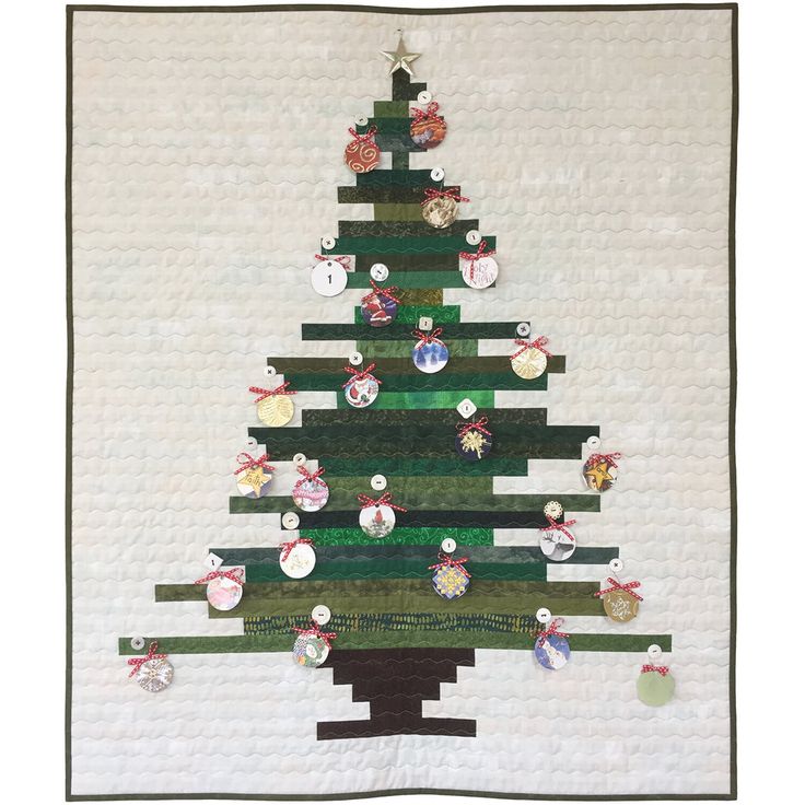 a quilted christmas tree with ornaments on it