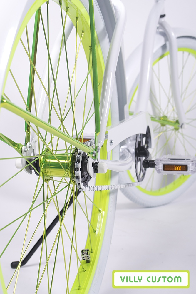 the front wheel of a bicycle is shown with yellow spokes and white rims