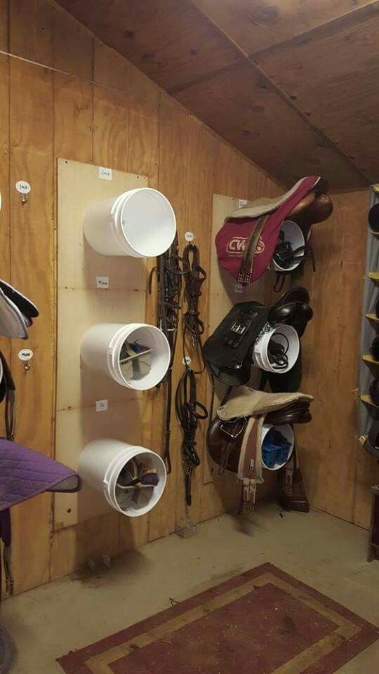 there is a room with many different items on the wall and in the corner are several cups