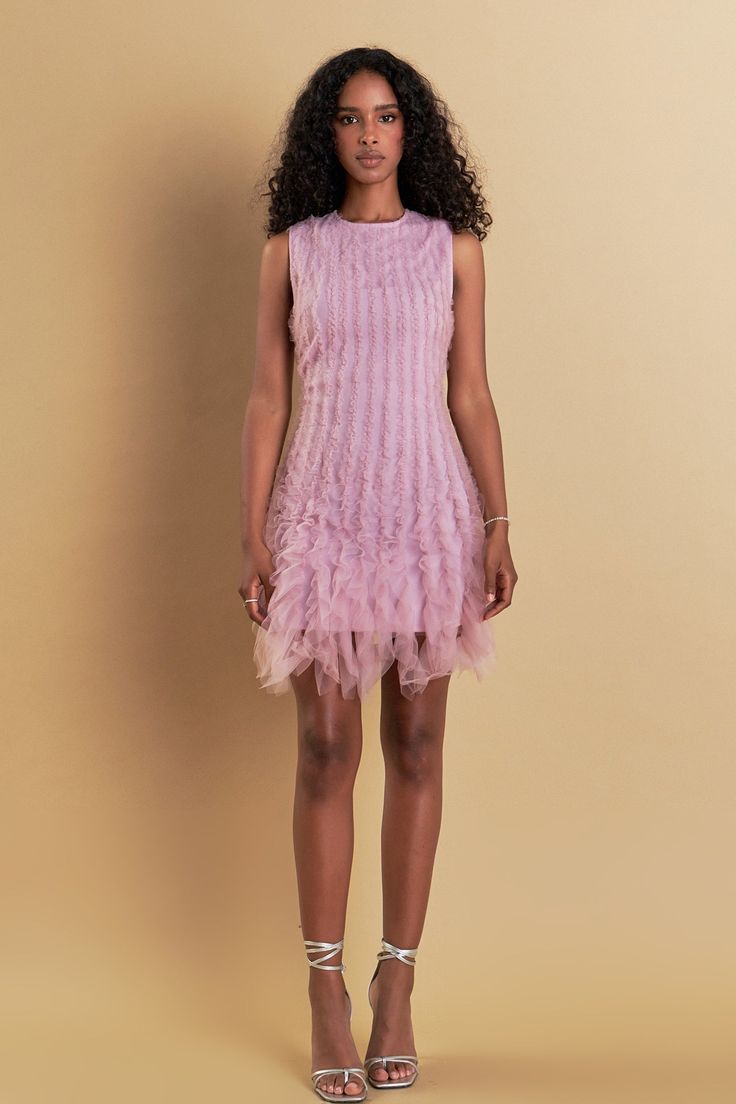 Turn heads in our Tulle Ruffled Mini Dress! This gorgeous dress boasts a playful mini length and delicate tulle fabric, perfect for your next special occasion. The ruffled details add a touch of feminine charm, while the sleeveless design keeps you cool and comfortable. This flirty dress is a must-have for any fashion-forward wardrobe. Pair it with your favorite heels and statement jewelry for a show-stopping look. Shop now and be the center of attention in our Tulle Ruffled Mini Dress! Tulle Mi Feminine Tulle Mini Dress For Evening, Elegant Pink Tulle Mini Dress, Elegant Knee-length Tulle Mini Dress, Spring Sleeveless Tulle Mini Dress, Summer Ruffled Mini Tutu Dress, Feminine Fitted Tulle Mini Dress, Spring Mini Length Fitted Tutu Dress, Cocktail Mesh Dress With Ruffles In Mini Length, Spring Fitted Mini Tutu Dress