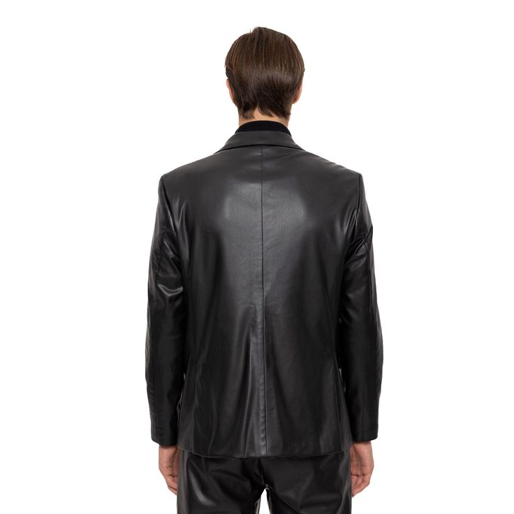 Create a suave look in this fine PU leather blazer with notched lapels and a slim, figure-hugging silhouette, making it a classy, easy-to-wear option that's a great addition to almost any outfit. Tailored from environmentally friendly materials and treated to resist stains and water for maximum longevity and durability. Men's Leather Jacket PU Leather Exterior Slim-Fit Notch Lapel Single-Breasted, Two-Button Closure 3 Exterior Pockets Dry Clean Only Imported Classic Leather Blazer For Semi-formal Occasions, Fitted Leather Sport Coat For Semi-formal Occasions, Sleek Winter Blazer With Suit Collar, Sleek Single-breasted Blazer For Night Out, Leather Blazer With Notch Lapel And Pressed Crease, Luxury Notch Lapel Blazer For Night Out, Sleek Business Blazer For Winter, Sleek Winter Business Blazer, Luxury Lapel Collar Blazer For Night Out