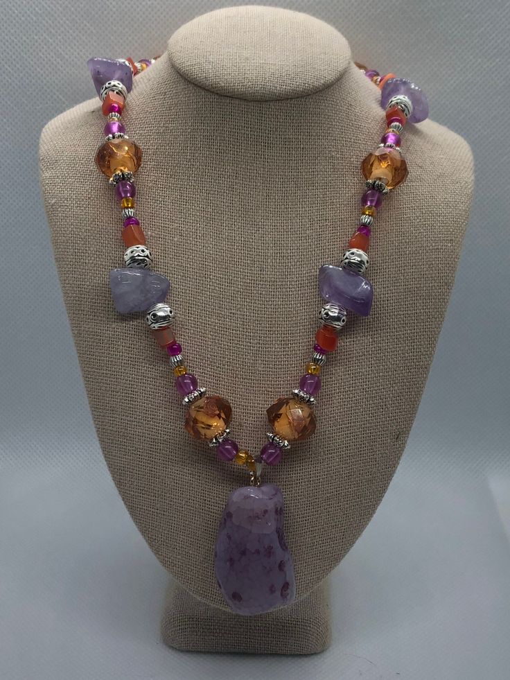 Beautiful orange and purple necklace with an agate pendant and features of amethyst stone, Czech glass and seashell beads. Beautiful Beaded Necklaces, Purple Necklace, Pretty Jewelry, Amethyst Necklace, Beaded Necklaces, Agate Pendant, Beaded Jewelry Diy, Amethyst Stone, Etsy Jewelry