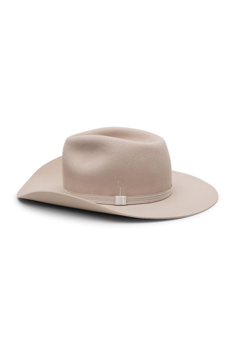 LIMITED EDITION – Discover our light beige cowboy and fedora hat hybrid Powder Verve, an exclusive Western-style hat that artfully blends the crown of a classic fedora with the bold, flanged brim of a cowboy hat. Crafted with a striking silver band detail repurposed from vintage royal uniforms, this hat exudes a sense of timeless elegance and history. Powder Verve is designed for those who embrace both sophistication and adventure, merging the regal allure of heritage with the free spirit of the White Western Hat For Formal Occasions, White Western Formal Hat, White Western Fedora With Flat Crown, Luxury Fedora For Kentucky Derby And Rodeo, Luxury Fedora For Rodeo And Kentucky Derby, Cream Panama Hat For Rodeo, Western Cream Hat With Short Brim, Short Brim Rigid Fedora For Western-themed Events, Elegant Beige Fedora For Rodeo