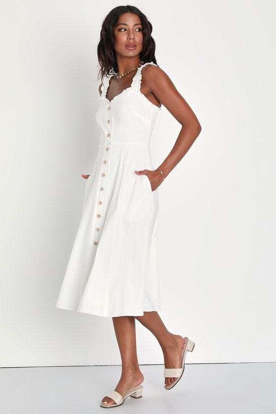 It's easy to envision a summer of ""amore"" in the Lulus Italian Romance White Ruffled A-Line Midi Dress With Pockets! Lightweight woven cotton shapes this simply adorable dress that has ruffled elastic straps and a darted bodice with a sweetheart neckline, all trimmed by matching ruffles. Decorative buttons accent the front, continuing across the fitted waist to the A-line midi skirt. Side seam pockets. Hidden zipper/clasp at back. Fit: This garment fits true to size. Length: Mid-calf length. B Linen Sundress For Daytime Spring, Spring Daytime Linen Sundress, Summer Midi Sundress For Daywear, Summer Cotton Midi Dress For Daywear, Casual Cotton Midi Dress For Summer, Chic Summer Cotton Midi Dress, Chic Cotton Midi Dress For Summer, Cotton Midi Dress For Summer, Summer V-neck Cotton Midi Dress