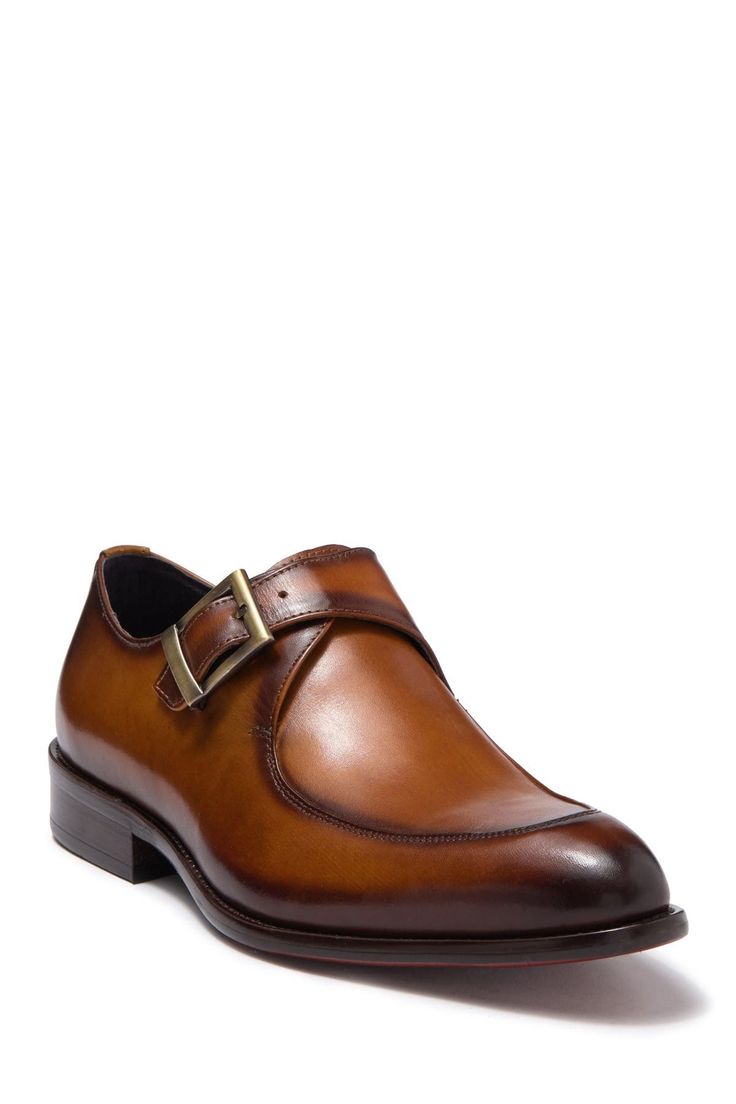 This leather constructed loafer features an almond toe and buckle strap.Sizing: True to size. M=standard width- Almond toe- Buckle strap vamp- Leather construction- Lightly padded insole- Topstitched detail- Stacked block heel- Welt stitching - Imported Leather upper, manmade sole Brown Monk Strap Shoes With Buckle Closure, Brown Leather Shoes With Buckle Closure And Almond Toe, Brown Monk Strap Shoes With Tang Buckle, Brown Pointed Toe Loafers With Buckle, Brown Pointed Toe Loafers With Buckle Closure, Leather Monk Strap Shoes With Buckle Closure, Leather Slip-on Loafers With Buckle Closure, Brown Almond Toe Loafers With Buckle Closure, Business Casual Monk Strap Shoes With Almond Toe