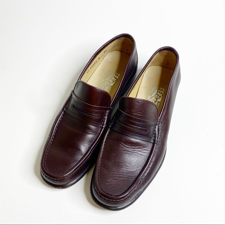 Timeless Salvatore Ferragamo Leather Loafer In Reddish Brown Color Size 7.5 D Made In Italy Classic Leather Shoes With Red Sole For Work, Classic Loafers With Red Sole And Plain Toe, Classic Loafers With Red Sole For Work, Classic Business Loafers With Red Sole, Classic Loafers With Red Sole For Business, Classic Slip-on Loafers With Red Sole, Brown Loafers With Red Sole And Round Toe, Classic Wingtip Loafers With Red Sole, Classic Burgundy Loafers With Rubber Sole