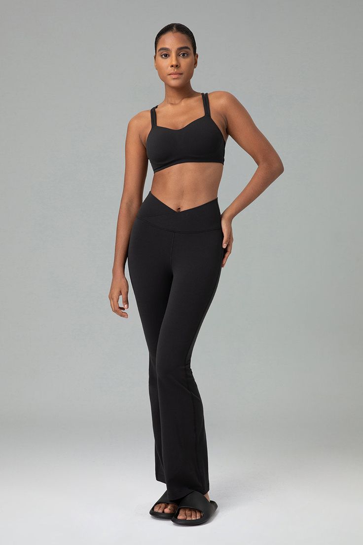 Product details Fabric type 81% Nylon, 19% Lycra Black Care instructions Machine Wash Rise style High Rise About this item Crafted from premium Lycra fabric, it offers unparalleled elasticity, ensuring a perfect fit that enhances your silhouette while providing exceptional comfort and freedom of movement. High-waisted leggings with a V-shaped cross waist design provide a secure and flattering fit. The high waistband offers excellent support, enhances natural curves, and prevents slipping. Boasts Sporty Bottoms With Built-in Bra And Stretch, Sporty Stretch Bottoms With Built-in Bra, Sleek Activewear With Built-in Bra And Stretch, Sleek Activewear With Built-in Bra, Black Yoga Pants With 4-way Stretch, Fitted Bottoms With Built-in Bra For Pilates, Black Stretch Pants With Contoured Waistband, Sleek Elastane Gym Bottoms, Sleek Stretch Workout Pants