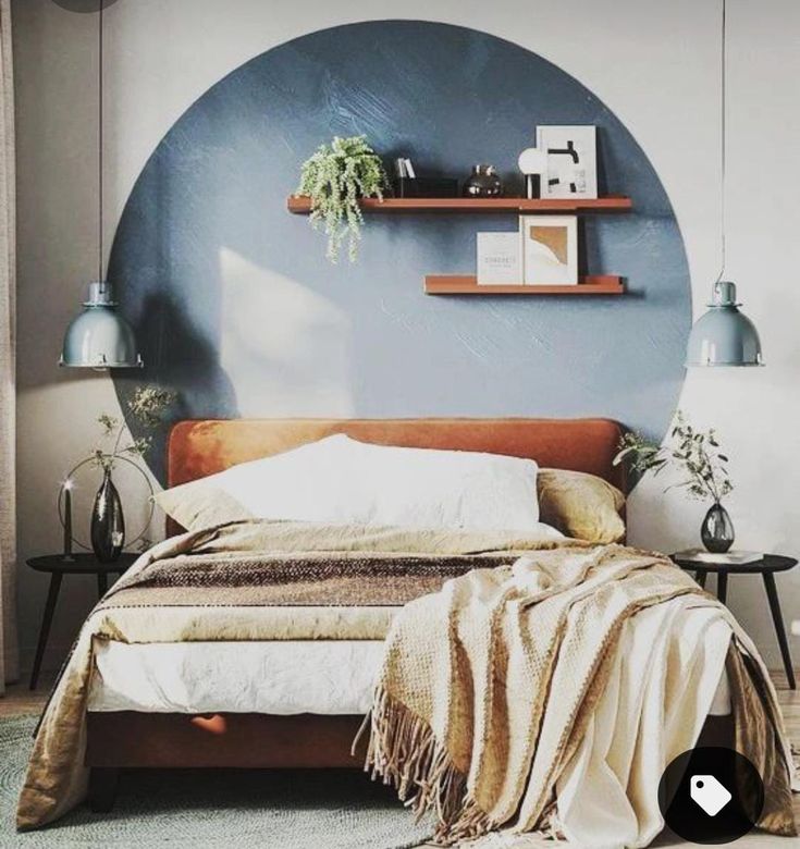 a bed sitting in a bedroom next to a wall mounted shelf with plants on it