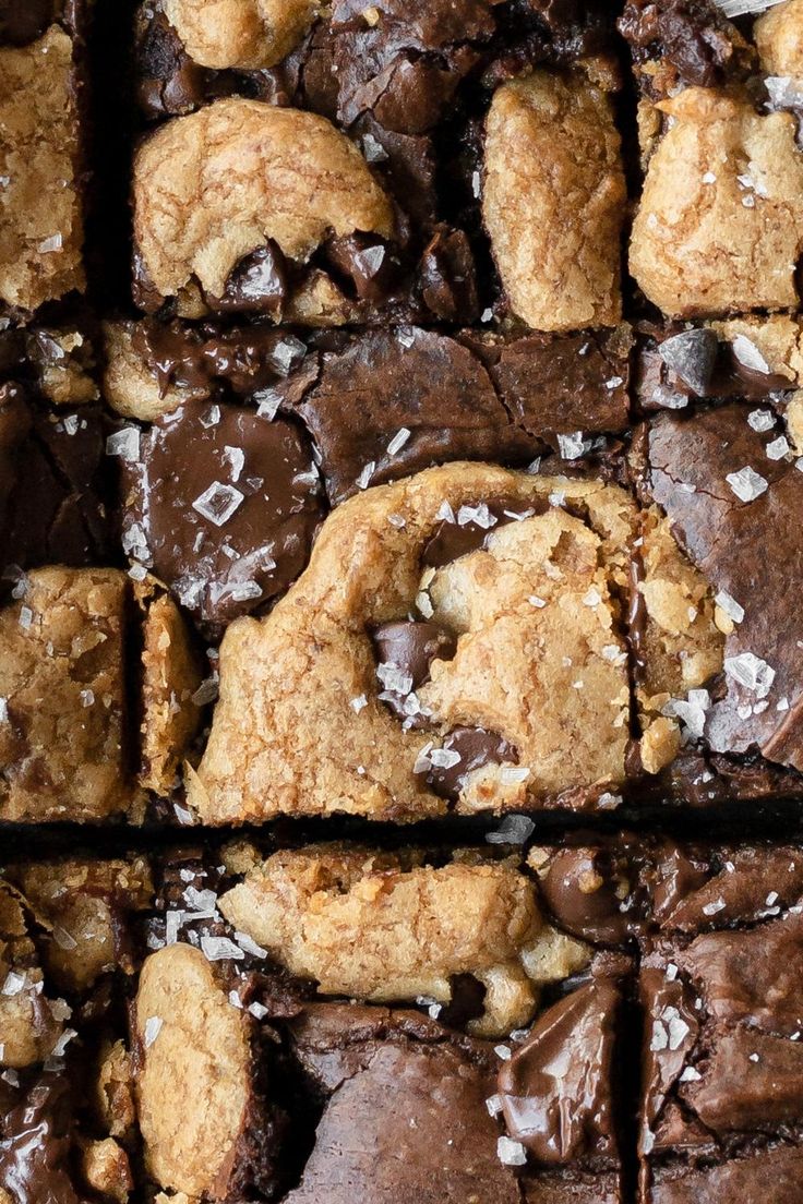 chocolate and coconut cookies arranged in squares on top of each other with white flakes