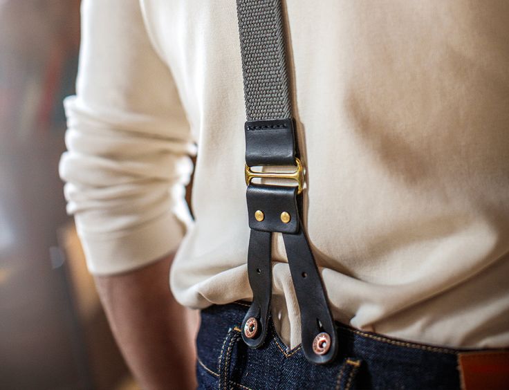 Designed and crafted in the UK, the &SONS leather braces make a stylish addition to our New Frontier Denims.Made from the finest leather, traditional brass fixings and adjusters, and complete with heavy elasticated straps. Timeless classic that I know will last a lifetime Complete your outfit freedom, style & individuality. Origins The origins of the bracers or suspenders as they're also known, go back as far as the 18th Century when ribbons would be tied to the buttonholes of trousers to preven Leather Braces, Raw Denim Jeans, Baker Boy Cap, Raw Denim, Falling Down, Henley Shirts, Well Dressed, Brown Boots, Suspenders