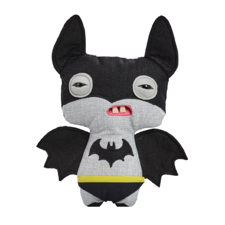 a stuffed toy bat with big eyes and fangs on it's head, sitting next to a white background