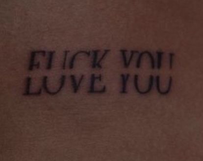 a tattoo with words written on it that says, flickk you love you in cursive font