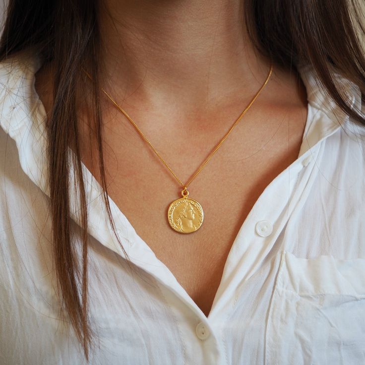 "Everyday fashion necklace, delicate coin pendant on dainty gold plated chain. Simple, minimalist and great on any outfit. Pendant size: 32mm Length: Choose from - 14\" to 18\" with optional extension of 1\"-2\" Please see VARIATIONS Model is wearing 17\" length. ♥ Back to my shop: https://etsy.me/2RQXbkO ♥ Ready to Ship ♥ FREE SHIPPING Estimated shipping time: 8- 20 business days ♥ How will I get it?  Your item will arrive in a beautiful, labeled box packaging. If you are purchasing this as a g Golden Coin Necklace, Gold Medallion Coin Necklace For Everyday, Everyday Gold Coin Necklace With Medallion, Everyday Yellow Gold Plated Coin Necklace, Everyday Yellow Gold Coin Necklace, Elegant Everyday Coin Pendant Necklace, Everyday Gold Plated Coin Pendant Necklace, Gold Coin Necklace With Adjustable Chain For Everyday, Everyday Gold Plated Pendant Coin Necklace