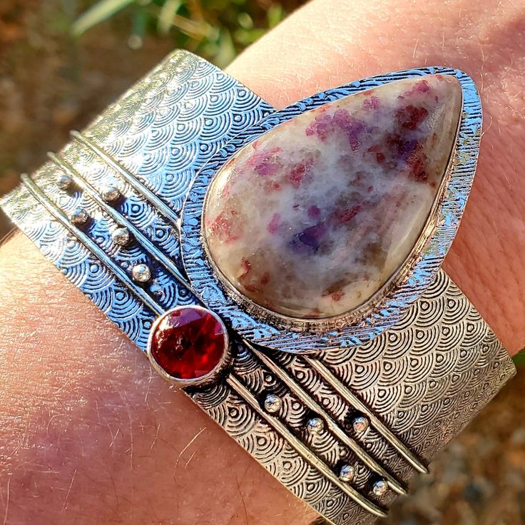 Brand New Handmade Ethnic Oversized Pink Tourmaline And Garnet Silver Cuff Bracelet. 925 Stamped New To Poshmark? Use Referral Code Kimberlyn222 To Receive $10. Silver Bohemian Cuff Bracelet With Natural Stones, Bohemian Sterling Silver Cuff Bracelet, Gold Stretch Bracelet, Adjustable Bangle Bracelet, Multi Strand Bracelet, Tourmaline Jewelry, Rainbow Bracelet, Bangle Bracelets With Charms, Silver Chain Bracelet