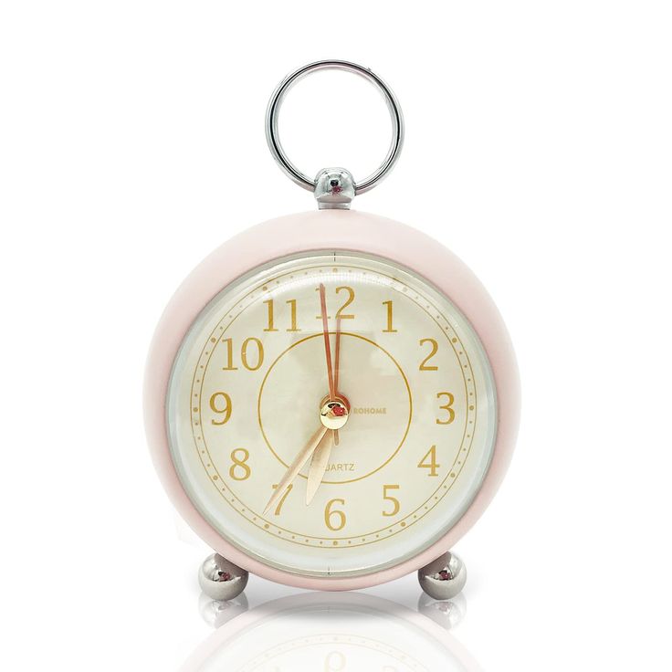 PRICES MAY VARY. 【Retro Classic Design】 This is a vintage small alarm clock with spherical glass. It looks very cute and fashionable. It has a metal painted frame and golden Arabic numerals. It is concise, clear and easy to understand. The base is supported by two small metal balls, and there is a hanging ring on the top, which is very suitable for placing on a bedside table or hanging in a child's room as a decoration. 【Silent Non-Ticking Quartz Movement】The tick-free, quiet and smooth quartz m Small Metal Desk, Retro Shelves, Analog Alarm Clock, Desk Kitchen, Desk Clocks, Clock For Kids, Shelf Clock, Radio Clock, Clock Decor