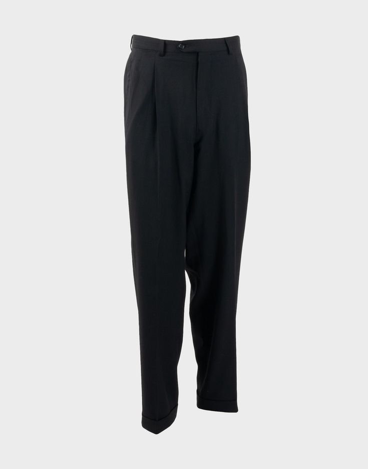 Valentino, men's classic mid-rise trousers in black made in 100% virgin wool. Size 52IT. Waist: 17.3 inches Rise: 12.6 inches Hips: 22.8 inches Length: 33.1 inches NOTE: Our company has a specialization in selling vintage and second-hand clothing and accessories. All the garments are carefully selected and offered for sale in excellent condition. The garments and accessories also are washed and ironed according to the terms of the well 'sterilized labels. Our selection as well as exclusive piece Black Wool Pants For Semi-formal Occasions, Semi-formal Black Wool Pants, Classic Black Wool Pants, Black Wool Business Pants, Tailored Black Wool Dress Pants, Black Wool Tailored Dress Pants, Black Wool Pants For Business Casual, Black Wool Pants For Business, Semi-formal Black Wool Bottoms