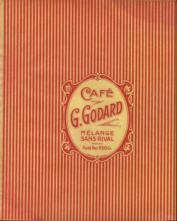 an orange and red striped book with the words cafe goodard on it