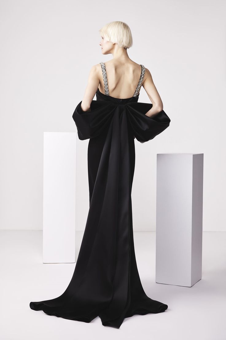 Indulge in elegance with the Audrey+Brooks 6500 gown. 🌟 This exquisite piece features a beaded strap bodice, draping, and a detachable bow stole for a touch of sophistication. The fit and flare silhouette, hidden back zipper, and satin lining elevate your style to pure luxury. Elevate your special occasion look with this stunning creation. Evening Dress Ball Gown With Detachable Train, Evening Ball Gown With Detachable Train, Elegant Evening Gown With Detachable Train, Elegant Evening Dress With Detachable Train And Fitted Bodice, Elegant Gown With Detachable Train For Gala, Elegant Evening Dress With Bow For Formal Events, Elegant Evening Dress With Bow For Formal Occasions, Elegant Gala Gown With Detachable Train, Elegant Formal Evening Dress With Bow