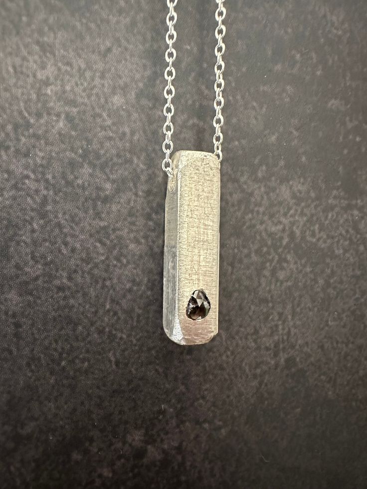 "Unique Silver Bar Pendant Necklace For Men, Urban Statement Raw Diamond Silver Jewelry, Handmade by OmriGoren. Elevate your style with our sterling silver necklace featuring a distinct pendant - a raw diamond hand-set on a silver block. This bar necklace isn't just an accessory; it's an artful expression that effortlessly complements both special occasions and daily wear. Embrace the uniqueness that comes with every facet of this piece, making it an accessory that simply can't be overlooked. My Sterling Silver Necklace With Rectangular Diamond Cut Pendant, Sterling Silver Jewelry With Single Cut Diamonds For Gifts, Silver Pendant Necklace With Single Cut Diamonds, Square Pendant Jewelry With Single Cut Diamonds For Gift, Minimalist Silver Jewelry With Single Cut Diamonds, Silver Necklace With Single Cut Diamonds For Everyday, Gift Jewelry With Square Pendant And Single Cut Diamonds, Gift Jewelry: Square Pendant With Single Cut Diamonds, Gift Jewelry With Single Cut Diamonds Square Pendant