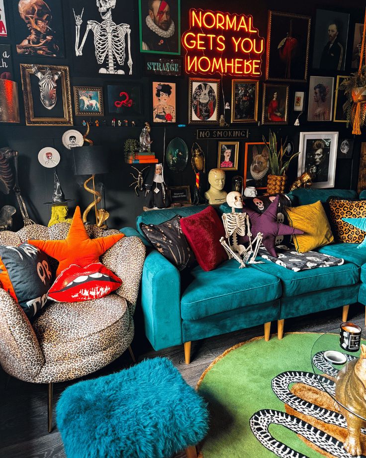 a living room filled with lots of colorful furniture and pictures on the wall above it