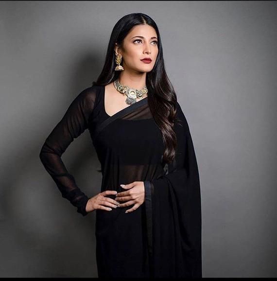 georgette saree with custom made blouse Any changes are easily done if needed please ask your style thanks Black Saree Designs, Black Saree Blouse, Full Sleeves Blouse Designs, Black Blouse Designs, Plazzo Suits, Shruti Haasan, Full Sleeve Blouse, Shruti Hassan, Blouse Back Neck Designs