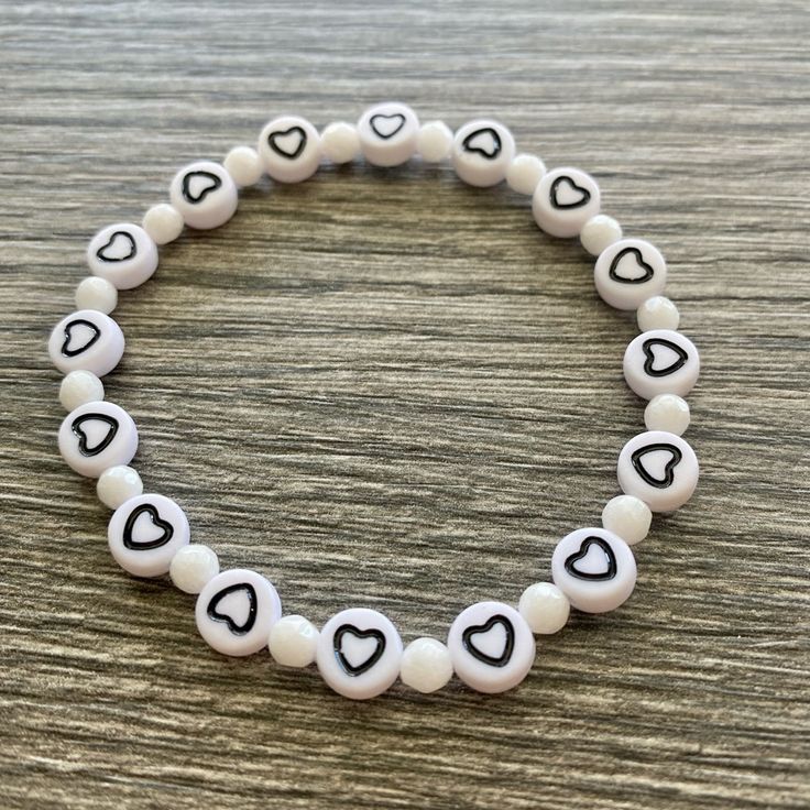 Women’s Black And White Heart And White Jade Bracelet. One Size Fits All. Looks Great As A Single Or Mixed With A Group To Create A Stack. Handmade In The Usa And Never Worn. Everyday Beaded Heart Bracelet, White Stretch Bracelet With Heart Charm As Gift, Everyday White Beaded Bracelets With Heart Beads, White Heart-shaped Jewelry With Letter Beads, Casual Black Heart-shaped Bracelets, Casual Black Heart-shaped Bracelet, Heart-shaped Letter Beads Bracelet, White Heart Charm Bracelet For Everyday, White Stretch Bracelet With Heart Charm