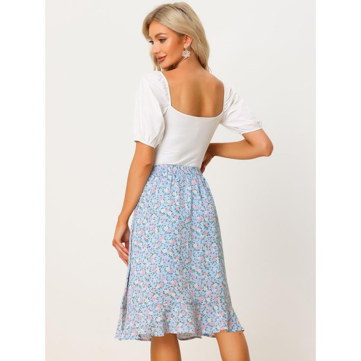 Through the summer seasons in this effortlessly chic flowy skirt. In a midi silhouette that wraps around, this skirt exudes the spring-summer feel you can't wait for. Sitting high on the waist, the light and breezy fabric trimmed with ruffles falls to a split skirt for impact and movement as you walk. Cut in a flared shape, this skirt is designed with a button closure at the side flattering for showing your looming legs. Adding a beautiful floral flourish for feminine appeal, this style is a fus Flowy Midi Length Bottoms For Day Out, Flowy Midi Length Skirt For Brunch, Fitted Midi Skirt For Vacation, Flowy Summer Midi-length Bottoms, Feminine Maxi Skirt For Summer Brunch, Fitted Midi Skirt For Summer, Fitted Midi-length Summer Skirt, Fitted Midi Length Summer Skirt, Midi Length Ruffled Skirt For Day Out