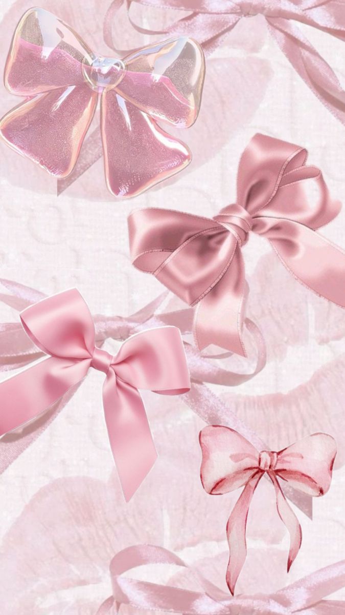 several pink bows and ribbons on a white background with some smaller ones in the middle