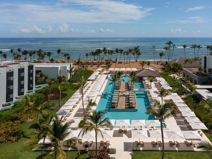 an aerial view of the pool and beach area