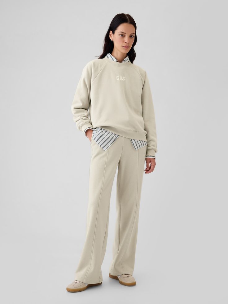 Soft fleece knit wide-leg sweatpants.  Elasticized waist.  Front slant pockets.  Seam at front.  Mid rise.  Straight silhouette with a relaxed fit.  Wide leg.  Models wearing Gap Creme Sweatpants Outfit, Wide Leg Sweats Outfit, Dressy Christmas Outfits, Outfit Ideas Holiday, Christmas Outfits Dressy, Washington Dc Fashion, Outfit Ideas Dressy, Matching Sweatsuit, Casual Holiday Outfits