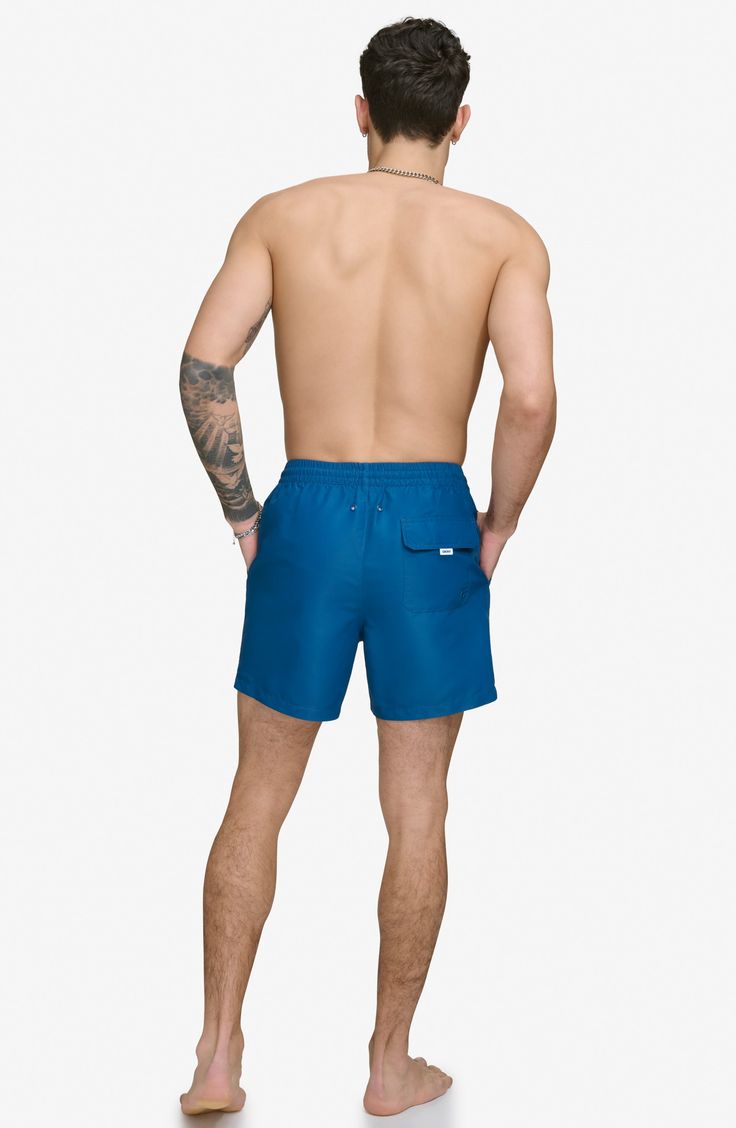 Soak up the sun in these recycled-fiber swim trunks built with UPF 40+ sun protection. 5" inseam (size Medium) Elastic/drawstring waist Front slant pockets; back patch pocket Lined 100% REPREVE polyester REPREVE recycled polyester is made from 100% post-consumer recycled plastic bottles Machine wash, tumble dry Imported Nylon Swimwear With Drawstring For Beach Season, Nylon Swimwear With Built-in Shorts And Relaxed Fit, Relaxed Fit Drawstring Swimwear For Beach, Beach Season Swim Trunks With Functional Drawstring, Relaxed Fit Beachwear Swimwear With Drawstring, Relaxed Fit Drawstring Beachwear Swimwear, Casual Swim Trunks With Functional Drawstring For Beach Season, Relaxed Fit Swim Trunks With Drawstring For Beach, Beach Swimwear With Functional Drawstring