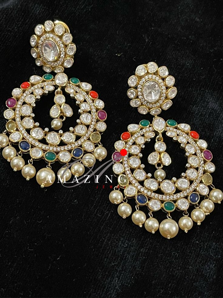 Silver Moissanite Polki Earring | Indian Wedding Jewelry | Indian Moissanite Polki Earring| Statement Earring Material : Silver Gemstone: Moissanite , Fresh Water Sea Pearls and Navratna Stones Stone colour: Uncut Polki Primary colour: Gold Size-Length: 70mm Width: 45mm Closure : Screw back and Clips Silver Intricate, hand crafted, Pure Silver Polki Earrings, studded with high quality Moissanite Polki comes with screw back and clips, made in 92.5 silver with 22ct gold plating. Product comes with Fusion Style Bridal Earrings For Diwali Celebration, Fusion Bridal Earrings For Diwali Celebration, Fusion Stone Work Earrings For Diwali, Fusion Style Stone Work Earrings For Diwali, Fusion Hand Set Chandbalis For Reception, Fusion Style Chandbali Bridal Earrings, Fusion Style Hand Set Chandbalis For Reception, Fusion Style White Bridal Earrings For Diwali, Elegant Multicolor Chandbalis With Latkans