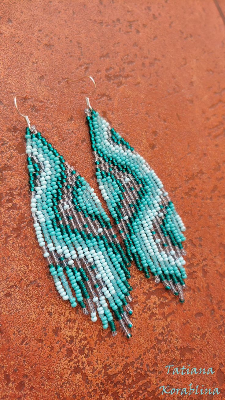 Author's Beaded Earrings Seed Bead Earring Chandelier - Etsy Canada Unique Green Long Drop Earrings, Turquoise Beaded Dangle Earrings For Festival, Turquoise Beaded Drop Earrings For Festival, Green Beaded Bohemian Chandelier Earrings, Festival Turquoise Beaded Drop Earrings, Bohemian Green Beaded Chandelier Earrings, Handmade Turquoise Chandelier Earrings With Round Beads, Adjustable Beaded Turquoise Chandelier Earrings, Unique Turquoise Beaded Earrings