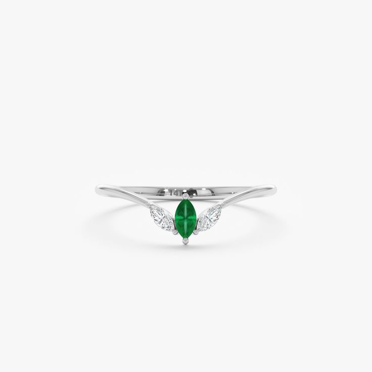 emerald nesting ring in solid white gold Green Marquise Diamond Ring Fine Jewelry, Marquise Emerald Diamond Ring In Green, Green Marquise Emerald Diamond Ring, Marquise Brilliant Cut Emerald Ring, Marquise Emerald Ring With Brilliant Cut, Elegant Green Promise Ring, White Gold Diamond Ring For May Birthstone, Elegant White Gold Emerald Birthstone Ring, Green Marquise Emerald Ring For Anniversary