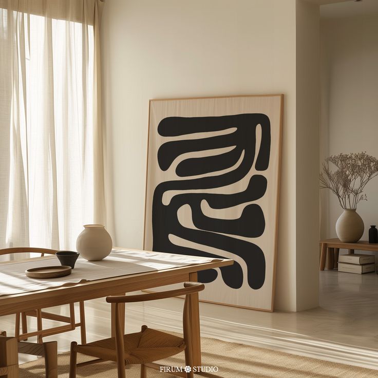 a dining room table and chairs in front of a large art piece on the wall