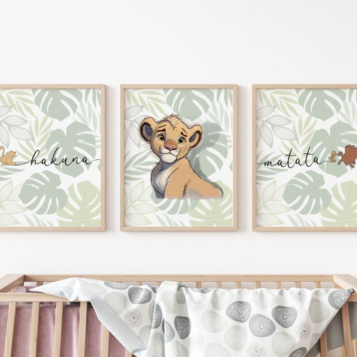 the lion king nursery art prints are hung above a crib in this baby's room