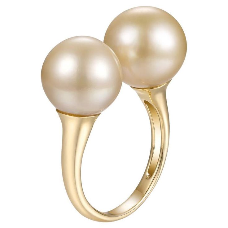 Introducing our breathtaking Champagne South Sea Pearl Ring, an epitome of elegance and sophistication. This exquisite ring showcases two champagne-colored South Sea pearls, ranging in size from 10.8mm to 11.5mm, exuding timeless beauty and allure. The pearls' enchanting luster adds a captivating shimmer, enhancing their natural charm and elegance. Selected for their exceptional quality, these pearls exhibit a warm champagne hue that exudes understated luxury. Set in 14 karat yellow gold, the ri Luxury Adjustable Gold Pearl Ring, Luxury Beige Jewelry For Formal Occasions, Classic Beige Jewelry For Formal Occasions, Elegant Beige Jewelry For Formal Occasions, Elegant Formal Beige Jewelry, South Sea Pearl Ring, Diamond Bracelet Design, Color Champagne, Sea Pearl