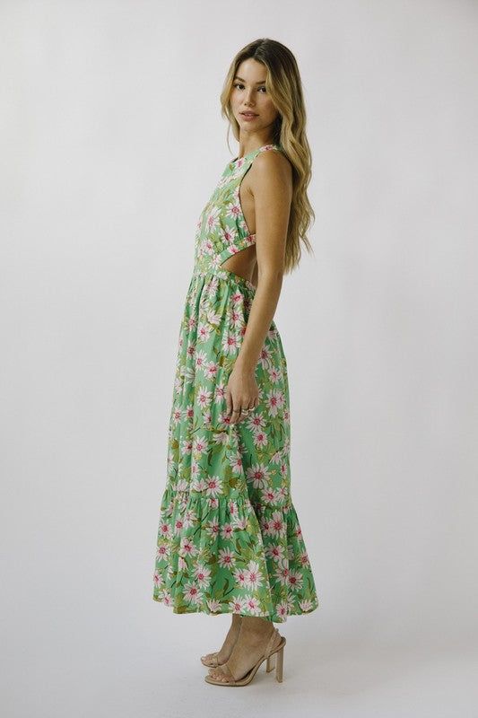 Floral midi dress. Features: Round neckline Sleeveless silhouette Open back with criss cross straps Tiered skirt Cinched waistband Fabric: 100% Cotton JD6143 Spring Midi Dress With Halter Neck And Crisscross Straps, Spring Halter Neck Midi Dress With Crisscross Straps, Spring Midi Dress With Crisscross Straps, Green Sleeveless Dress For Summer Brunch, Green Sleeveless Halter Dress For Garden Party, Spring Midi Dress With Crisscross Strappy Back, Sleeveless Green Halter Dress For Garden Party, Green Halter Dress For Garden Party, Green Tie-back Backless Dress