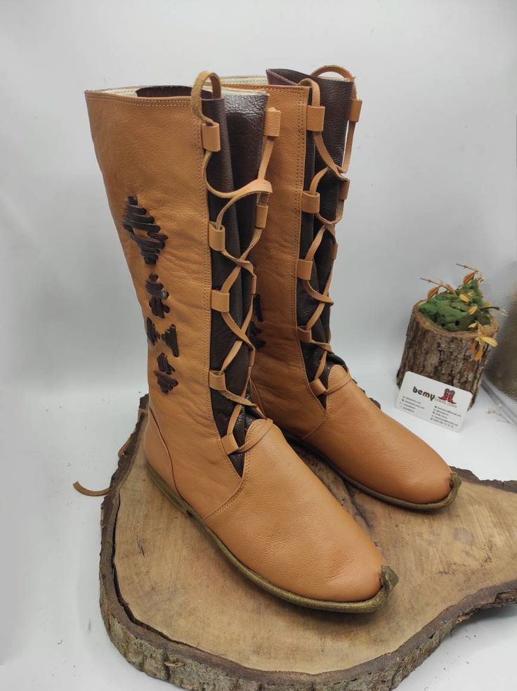 Medieval boots are made with naturel leather. Very soft and comfy. We have every size is availble. 3 us women to 14 us women. %100 naturel leather and colour. Leather sole.  Fits both for men and women. Handmade boots. We have door to door fast shipping. İf you have any question please contact with us. bemyboots.etsy.com Our second shop for ethnic home decoration; gypsydecoration.etsy.com Thank You Greek Boots, Medieval Style Round Toe Boots For Fall, Fall Festival Leather Boots, Leather Boots For Fall Festival, Medieval Style Brown Lace-up Boots, Medieval Brown Lace-up Boots, Western Brown Leather Lace-up Boots, Brown Boots With Lacing And Round Toe, Rustic Brown Lace-up Boots