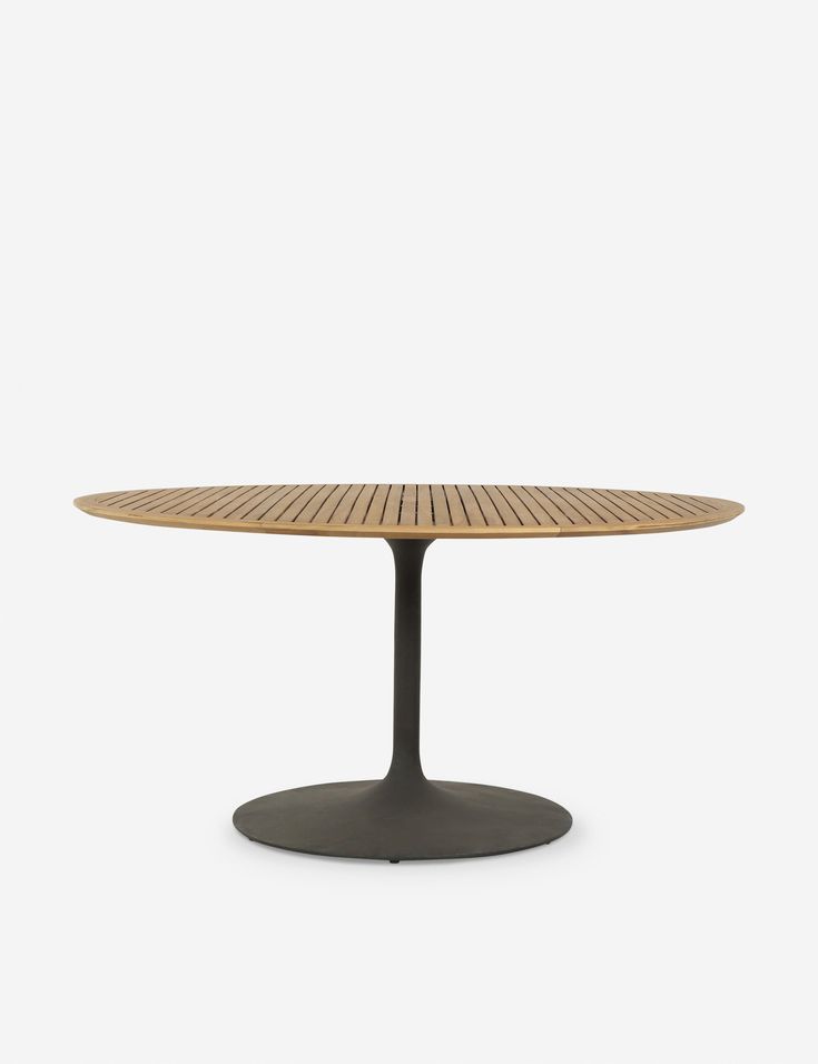 an oval wooden table with black base