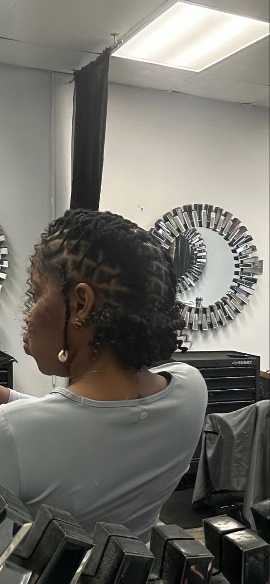 Barrel twist style with two strands hanging Two Barrels Locs, Female Barrel Twist, Barrel Twist With Curly Bun, Barrel Twist Loc Styles Women, Barrel Twists Loc Styles Women, Barrel Twists Locs Women, Two Barrel Twist Locs Women, Barrel Twist Women, Barrell Twist On Locs For Women