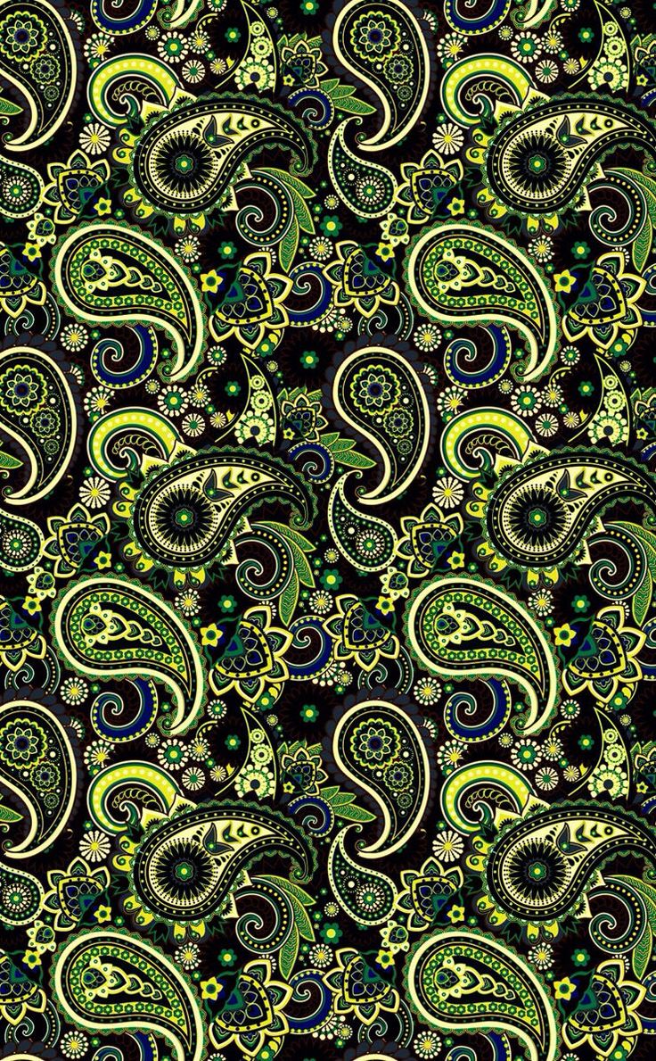 an image of a green and blue paisley pattern on a black background with white dots