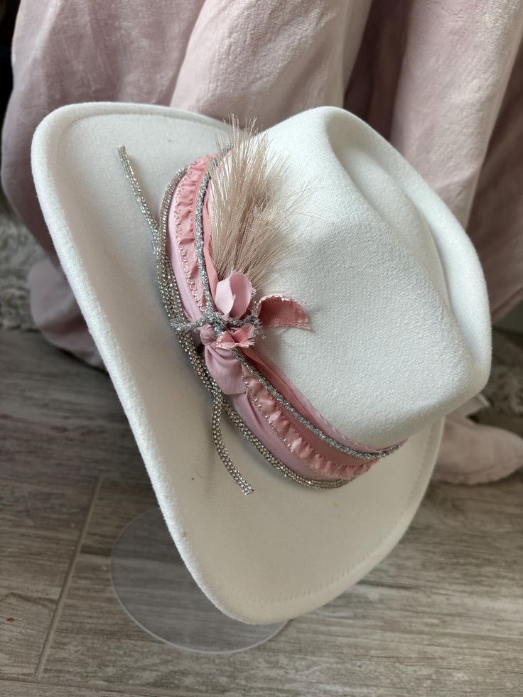 One size fits most  Suede cowgirl hat  Georgeous decorative concert hat  One of a kind  White, pinks golds and silvers  Free shipping pink or white choose at checkout  listing is for one hat Western One Size Costume Hats For Rodeo, Western Style Costume Hats For Rodeo, Western Costume Hats For Western-themed Events, Western Style Hat For Rodeo, Western Costume Hats For Themed Events, Western Adjustable Costume Hats And Headpieces For Country Events, Western-themed Costume Hats And Headpieces, Western-styled Costume Hats For Western-themed Events, Western Style Rodeo Mini Hat