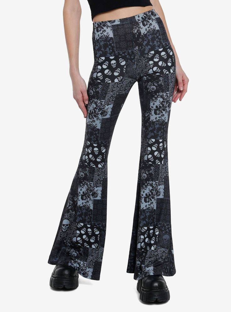 Keep your look artsy with a splash of darkness in these flare leggings! It features a monochromatic allover paisley skull patchwork print and a bellbottom flare leg. Stretchy waistband.95% polyester; 5% spandexWash cold; dry lowLength: 42"Stretchy materialImportedListed in junior sizesModel is 5'10"Model wears size Small