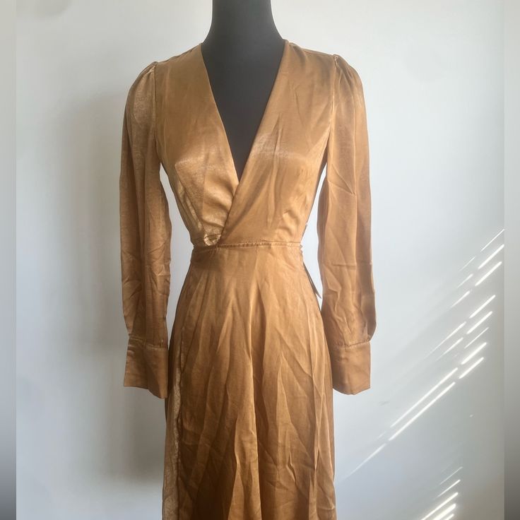 Nwt Satin Wrap Dress Size - Xs Ariana Dress Chic Gold Midi Dress For Date Night, Chic Gold Long Sleeve Midi Dress, Elegant Gold Dress For Workwear, Gold V-neck Midi Dress For Formal Occasions, Gold Silk Dress With Long Sleeves, Formal Gold V-neck Midi Dress, Elegant Gold Mini Dress For Fall, Elegant Gold V-neck Midi Dress, Spring Fitted Gold Midi Dress